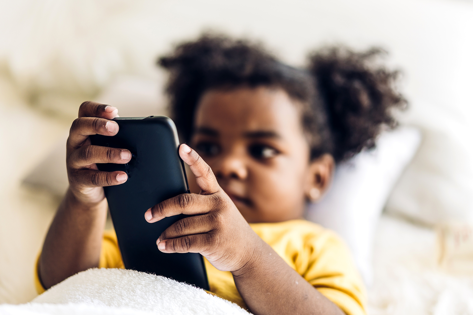 Portrait Of Happy Little Child African American Girl Using Digit
