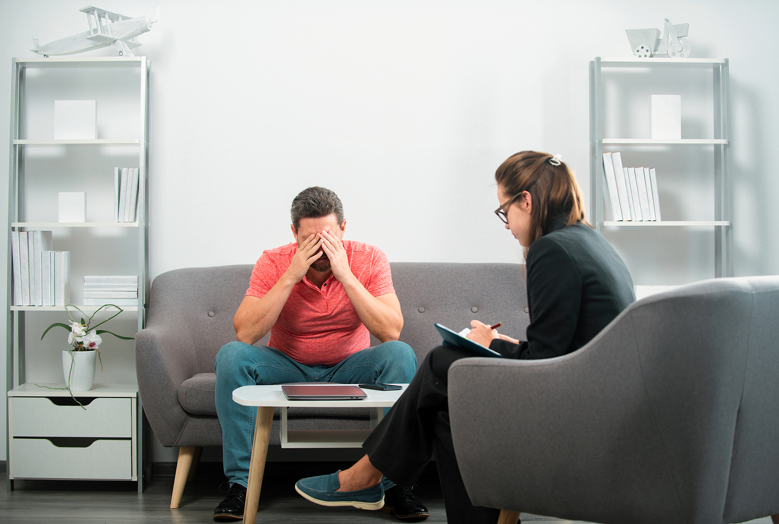 Depressed Middle Aged Man Problem Therapy. Man Discussing His Ps